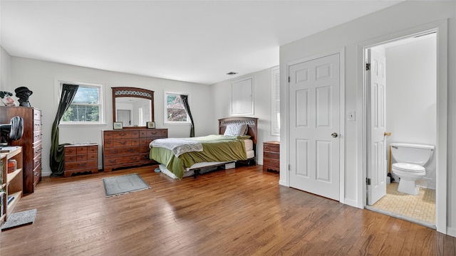 7 Kings Ln, Montrose, NY 10548 - bedroom with wood finished floors and connected bathroom