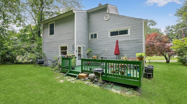 7 Kings Ln, Montrose, NY 10548 - rear view of house featuring a lawn, a deck, and a chimney