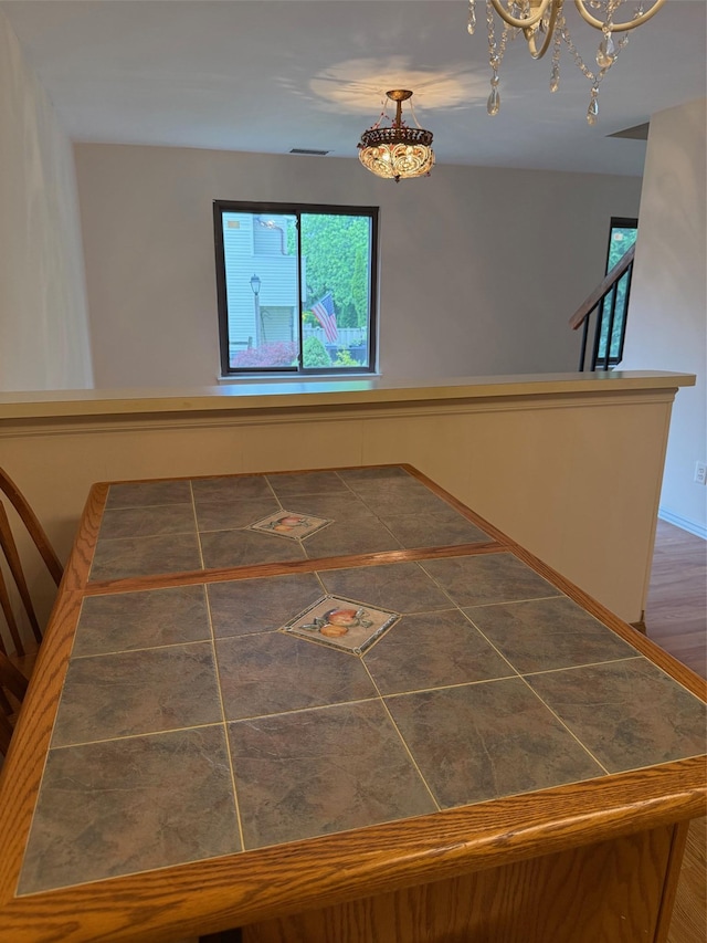 1012 Skyline Dr, Coram, NY 11727 - interior space featuring a chandelier