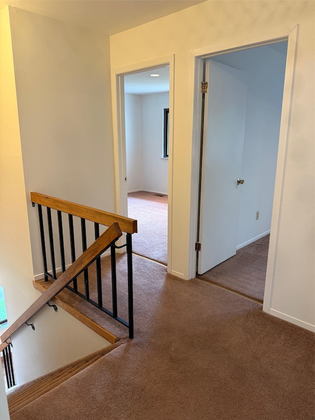 1012 Skyline Dr, Coram, NY 11727 - hall with carpet and baseboards