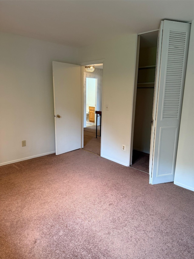 1012 Skyline Dr, Coram, NY 11727 - unfurnished bedroom with carpet, a walk in closet, and a closet