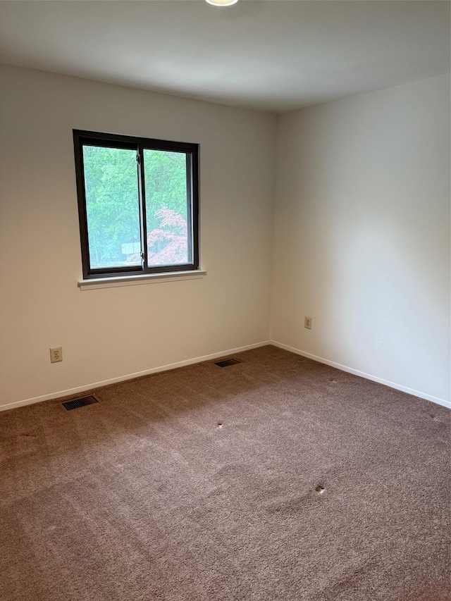 1012 Skyline Dr, Coram, NY 11727 - spare room featuring carpet
