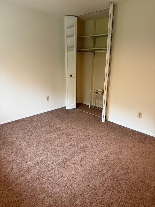 1012 Skyline Dr, Coram, NY 11727 - unfurnished bedroom featuring carpet floors and a closet