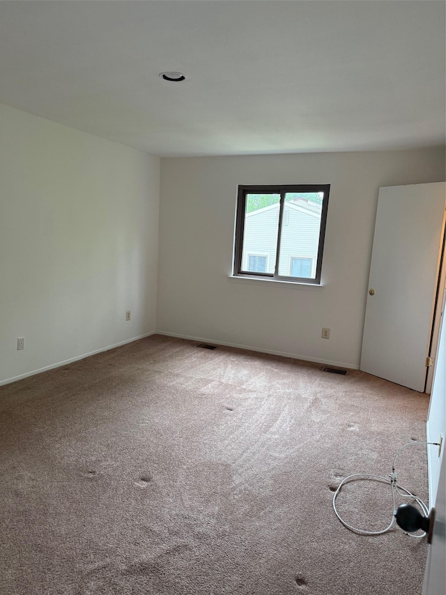 1012 Skyline Dr, Coram, NY 11727 - carpeted empty room with baseboards