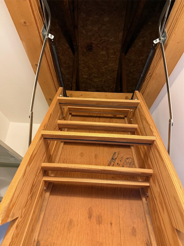 1012 Skyline Dr, Coram, NY 11727 - staircase with wood finished floors