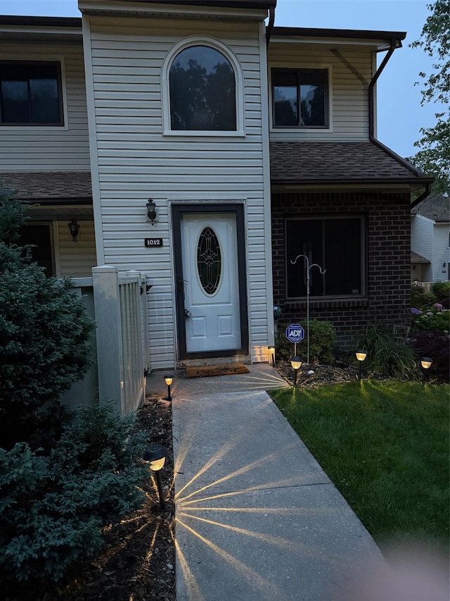 1012 Skyline Dr, Coram, NY 11727 - doorway to property featuring brick siding