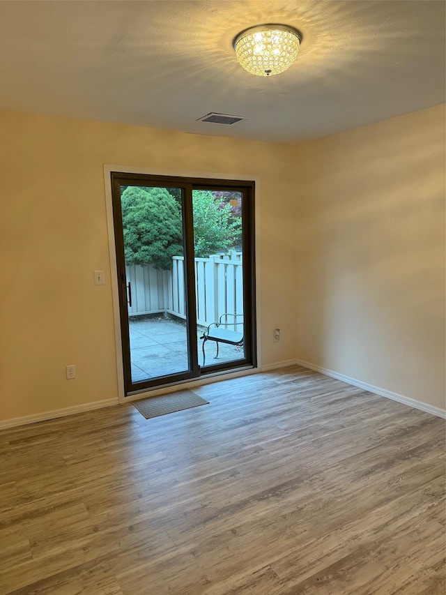 1012 Skyline Dr, Coram, NY 11727 - empty room with wood finished floors and baseboards