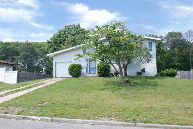 40 Gettysburg Dr, Holbrook, NY 11741 - view of property hidden behind natural elements featuring driveway and an attached garage