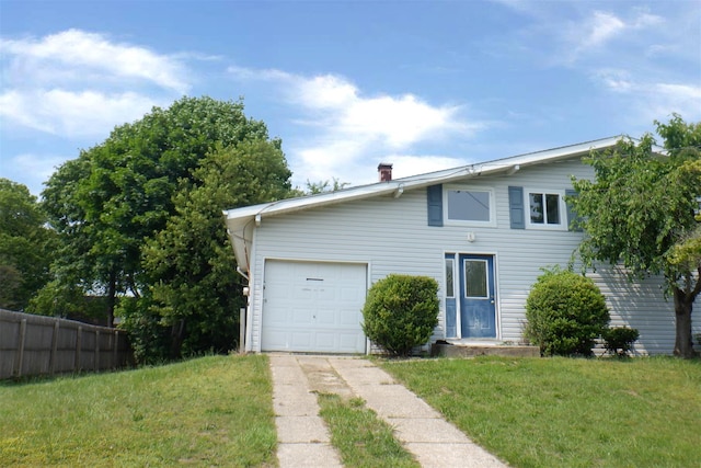 40 Gettysburg Dr, Holbrook, NY 11741 - view of front of home with driveway, a chimney, and an attached garage
