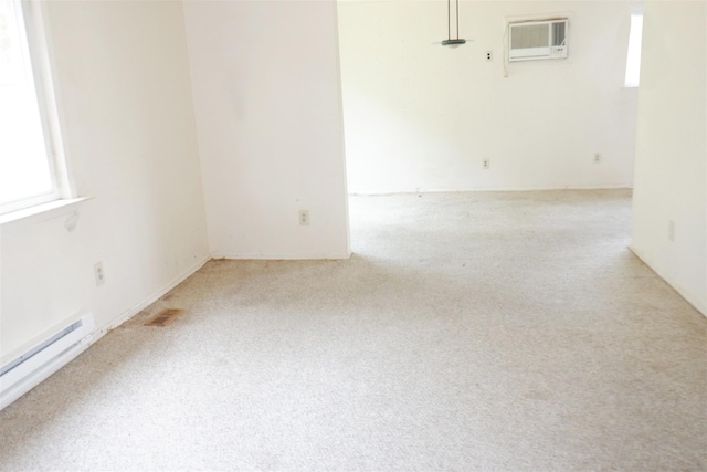 40 Gettysburg Dr, Holbrook, NY 11741 - carpeted empty room featuring a wall unit AC and baseboard heating
