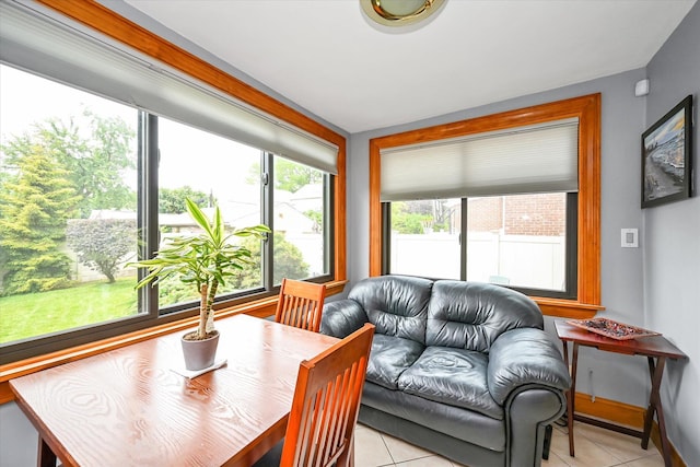 33-50 210th St, Bayside, NY 11361 - sunroom featuring tile patterned floors and plenty of natural light