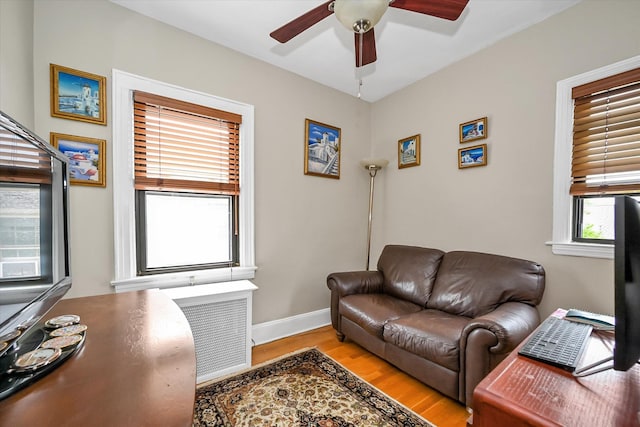 33-50 210th St, Bayside, NY 11361 - living area with a ceiling fan and wood finished floors