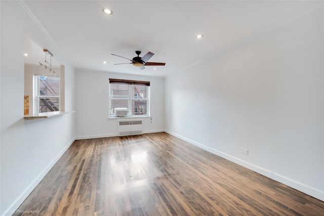 39-60 52nd St Unit 4F, Woodside, NY 11377 - unfurnished room with radiator, a ceiling fan, wood finished floors, recessed lighting, and crown molding