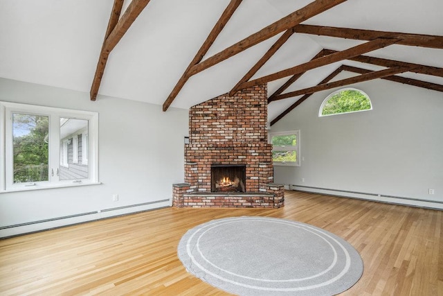 542 Montauk Hwy, Southampton, NY 11968 - unfurnished living room with baseboard heating, high vaulted ceiling, wood finished floors, a brick fireplace, and beam ceiling