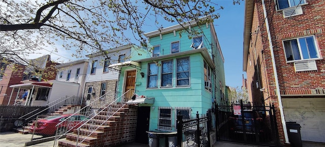 10439 42nd Ave, Corona, NY 11368 - view of front of house featuring a gate