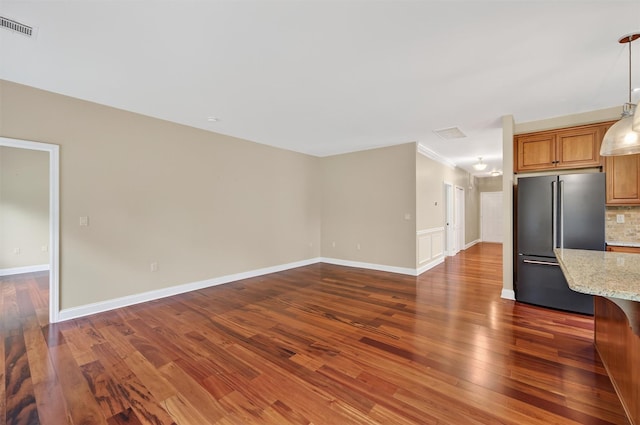 84 Jasmine Dr, Middletown, NY 10940 - unfurnished living room featuring dark wood-style floors and crown molding