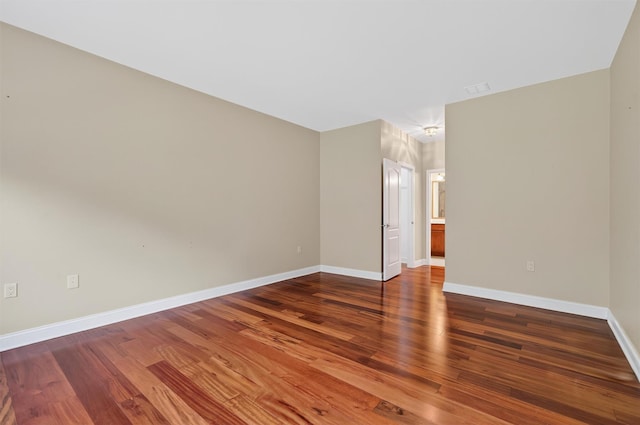 84 Jasmine Dr, Middletown, NY 10940 - empty room with baseboards and wood finished floors
