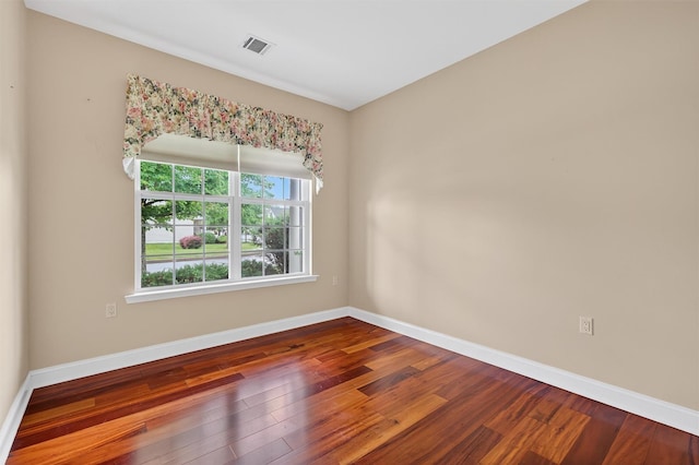 84 Jasmine Dr, Middletown, NY 10940 - empty room featuring dark wood-type flooring and baseboards