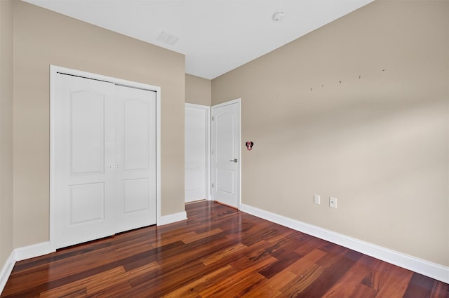 84 Jasmine Dr, Middletown, NY 10940 - unfurnished bedroom with wood finished floors and a closet