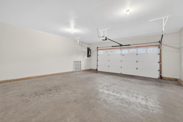 84 Jasmine Dr, Middletown, NY 10940 - garage with a garage door opener and electric panel