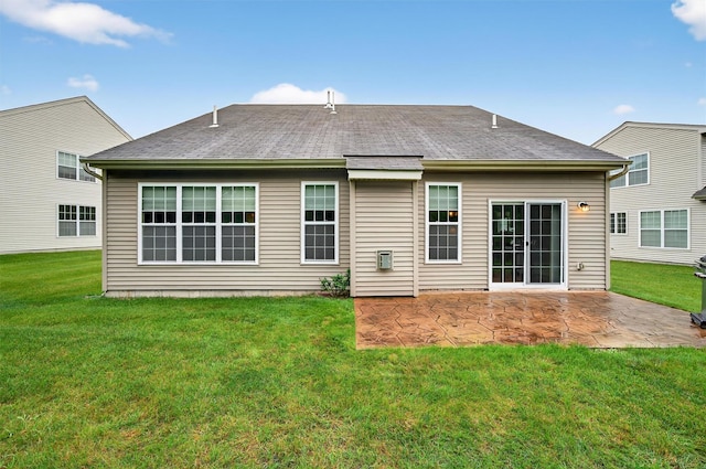 84 Jasmine Dr, Middletown, NY 10940 - back of property with a patio, a lawn, and a shingled roof