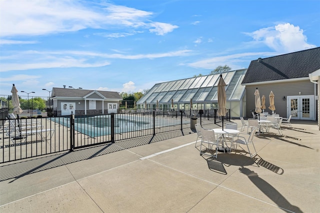 84 Jasmine Dr, Middletown, NY 10940 - community pool with french doors and a patio