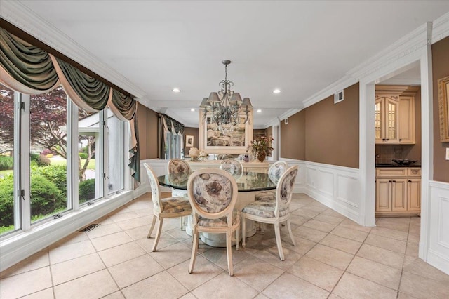 6 Laurelwood Ct, Dix Hills, NY 11746 - dining room featuring light tile patterned floors, a chandelier, recessed lighting, a decorative wall, and wainscoting