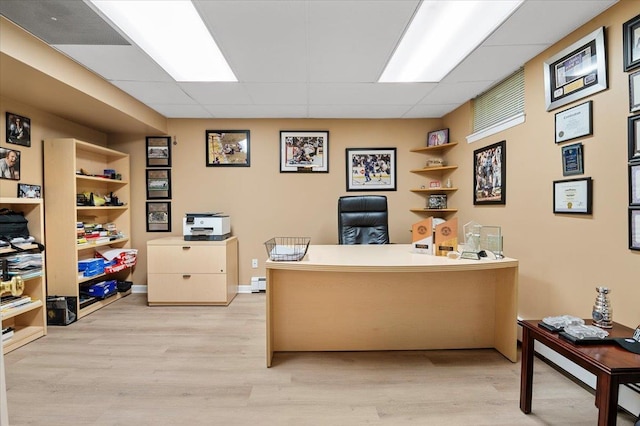 6 Laurelwood Ct, Dix Hills, NY 11746 - office space featuring a drop ceiling, a baseboard radiator, and light wood-type flooring