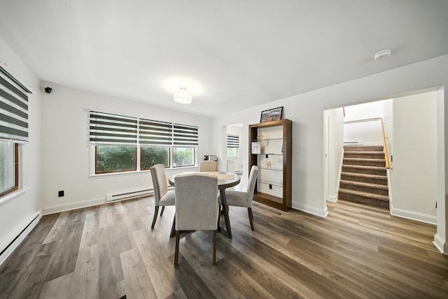 2 Woodland Way N, Ellenville, NY 12428 - dining room featuring stairway, wood finished floors, and baseboard heating