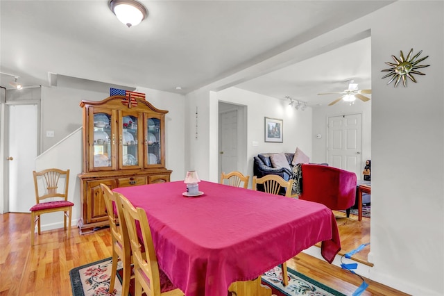 178 Magnolia Dr, Mastic Beach, NY 11951 - dining area with rail lighting, light wood-type flooring, and ceiling fan