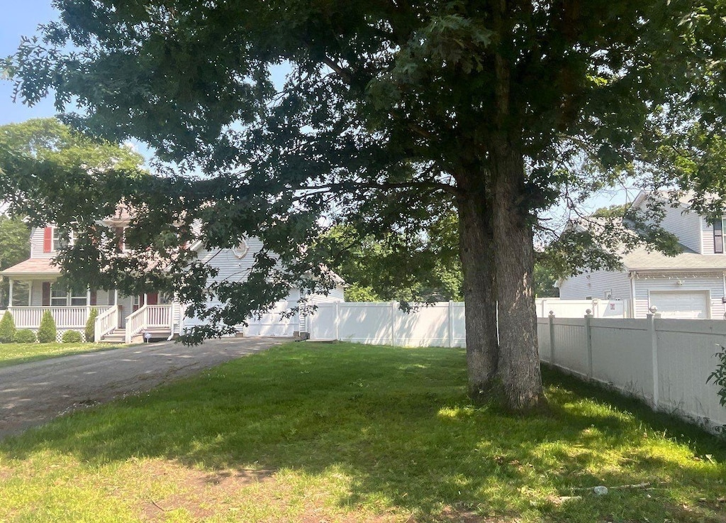 85 Patchogue Ave, Mastic, NY 11950 - view of yard featuring driveway