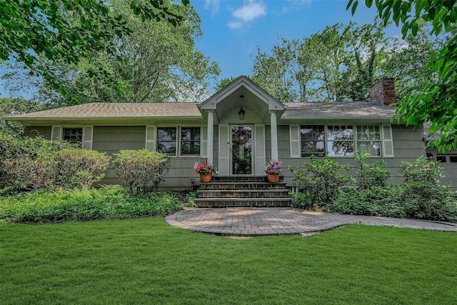 18 Huyler Ct, Setauket, NY 11733 - ranch-style house featuring a front yard and a chimney