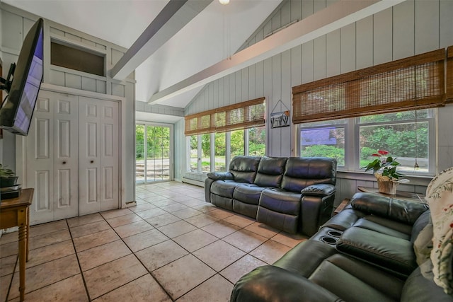 18 Huyler Ct, Setauket, NY 11733 - living area featuring light tile patterned flooring, high vaulted ceiling, wooden walls, and beamed ceiling