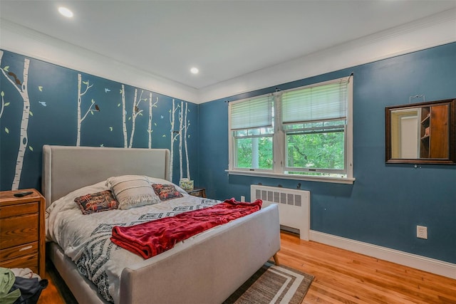 18 Huyler Ct, Setauket, NY 11733 - bedroom featuring radiator, wood finished floors, crown molding, and recessed lighting