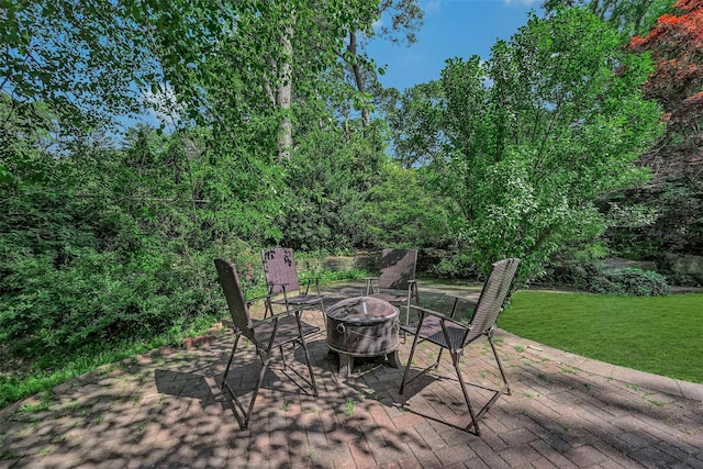 18 Huyler Ct, Setauket, NY 11733 - deck with an outdoor fire pit, a patio area, and a yard