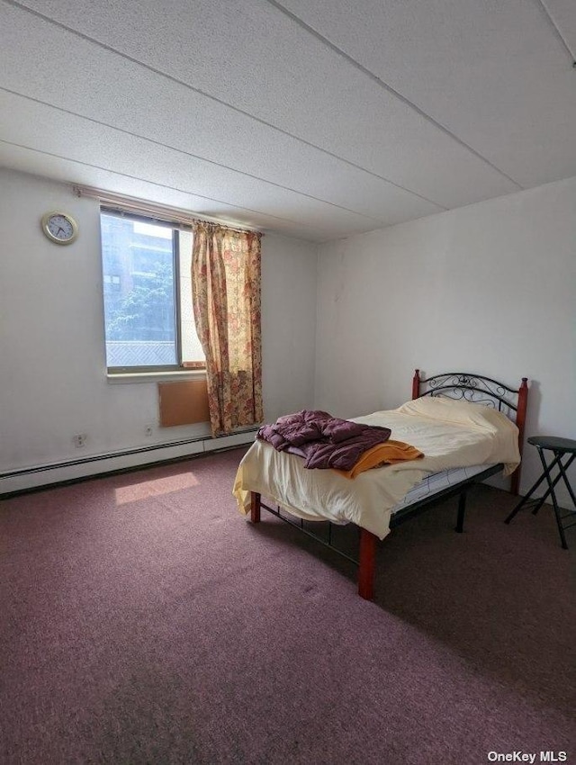 136-24 Maple Ave Unit 3B, Flushing, NY 11355 - carpeted bedroom featuring a baseboard radiator