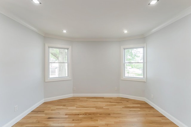 237 Linden Ave, Westbury, NY 11590 - spare room with light wood-style flooring, recessed lighting, and ornamental molding