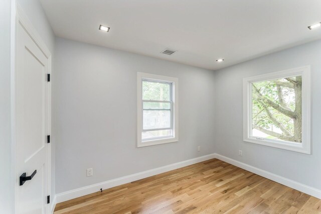 237 Linden Ave, Westbury, NY 11590 - spare room with healthy amount of natural light, light wood finished floors, and recessed lighting