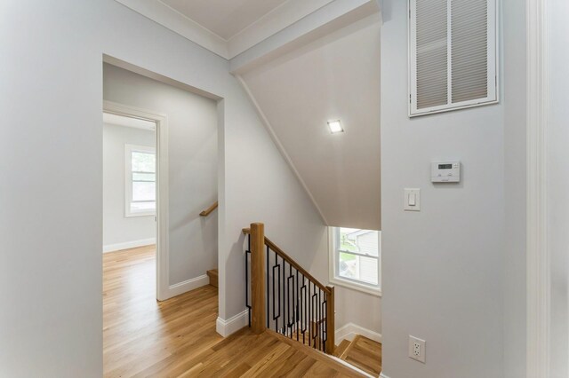237 Linden Ave, Westbury, NY 11590 - staircase with wood finished floors and ornamental molding