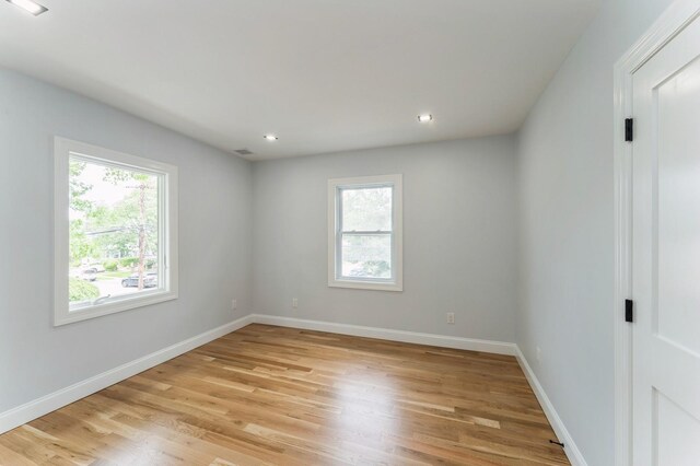 237 Linden Ave, Westbury, NY 11590 - empty room with plenty of natural light, light wood-type flooring, and recessed lighting