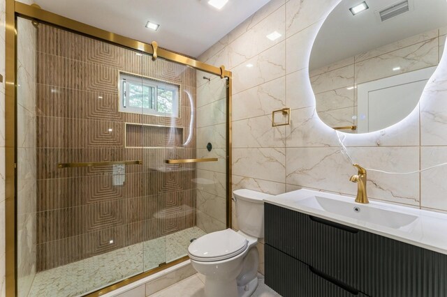 237 Linden Ave, Westbury, NY 11590 - bathroom with tile walls, vanity, and a shower stall