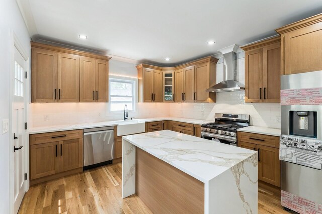 237 Linden Ave, Westbury, NY 11590 - kitchen with wall chimney exhaust hood, appliances with stainless steel finishes, backsplash, light wood finished floors, and glass insert cabinets
