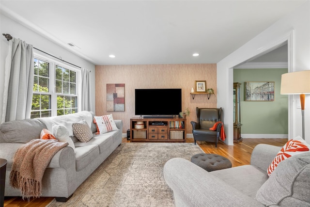 38 Southview Ct, Poughkeepsie, NY 12603 - living area with an accent wall, recessed lighting, and wood finished floors