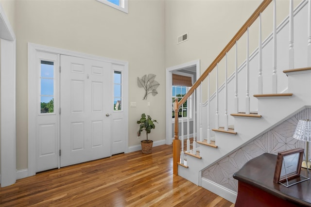 38 Southview Ct, Poughkeepsie, NY 12603 - entryway featuring a high ceiling, wood finished floors, and stairs