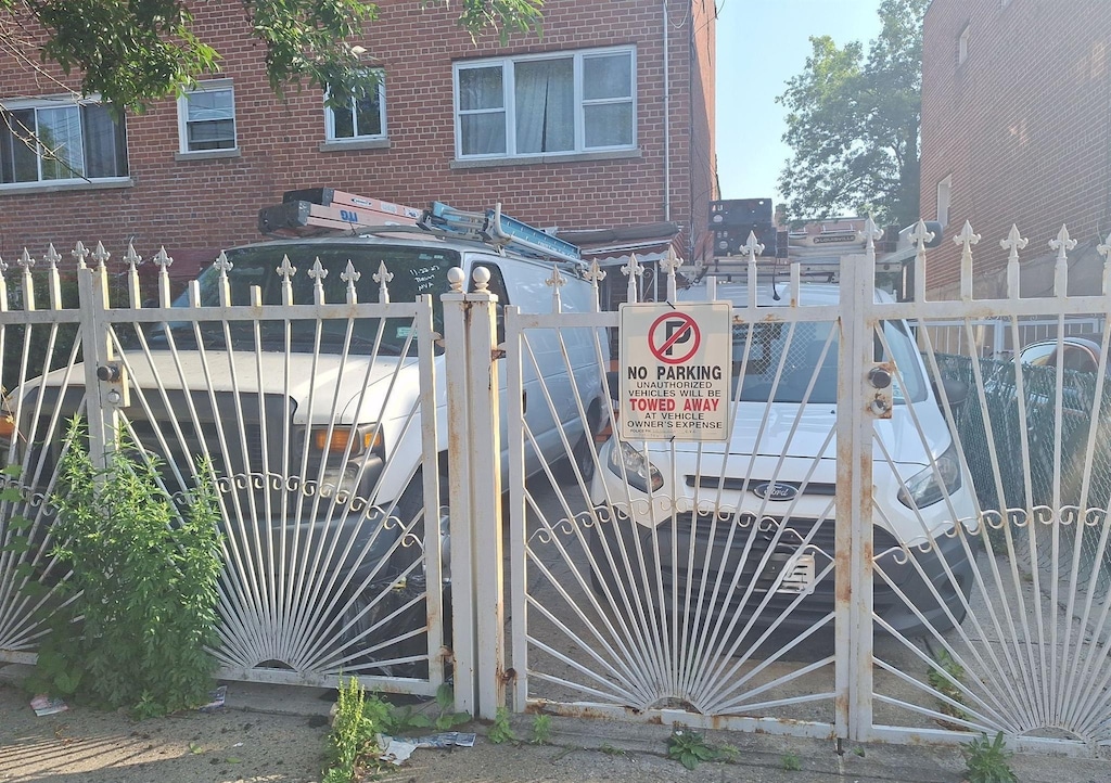 1037 E 219th St, Bronx, NY 10469 - gate with a fenced front yard