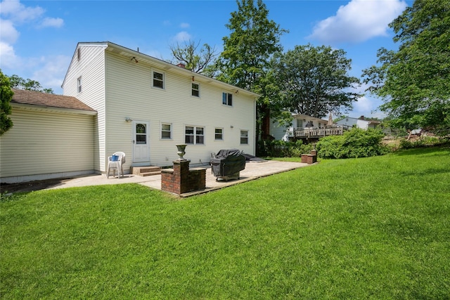 51 Lester Dr, Orangeburg, NY 10962 - rear view of property featuring a patio and a lawn