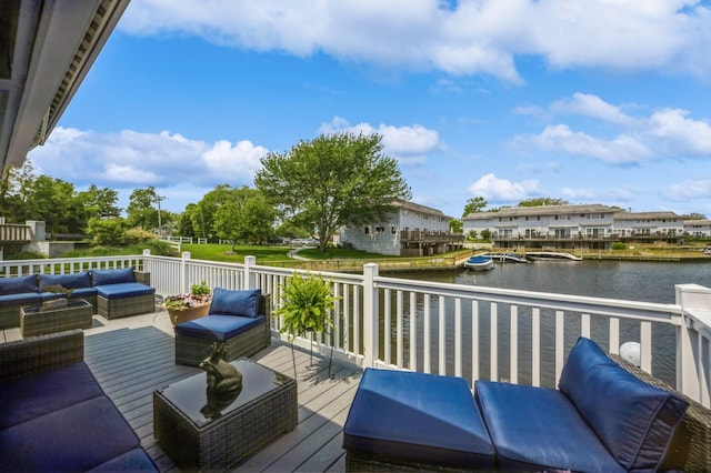 35 Library Ave Unit 8X, Westhampton Beach, NY 11978 - wooden deck featuring an outdoor living space and a water view