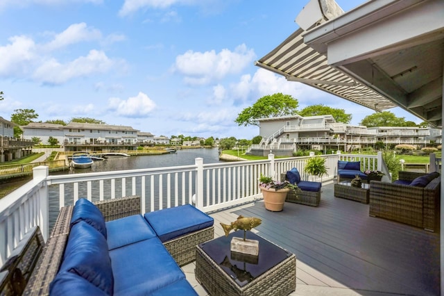 35 Library Ave Unit 8X, Westhampton Beach, NY 11978 - deck with an outdoor living space and a water view