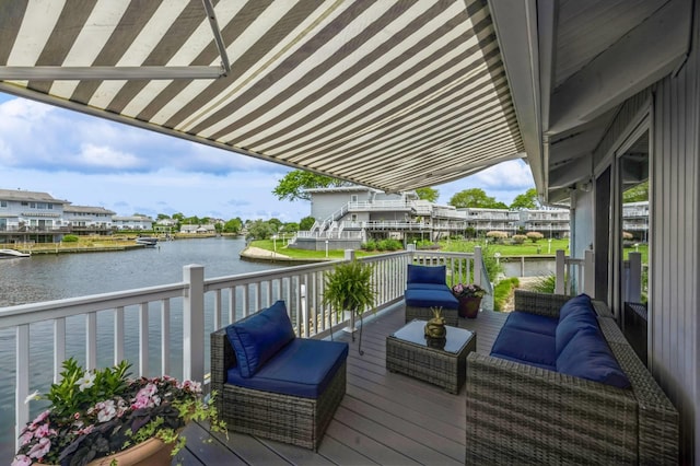 35 Library Ave Unit 8X, Westhampton Beach, NY 11978 - deck featuring outdoor lounge area and a water view
