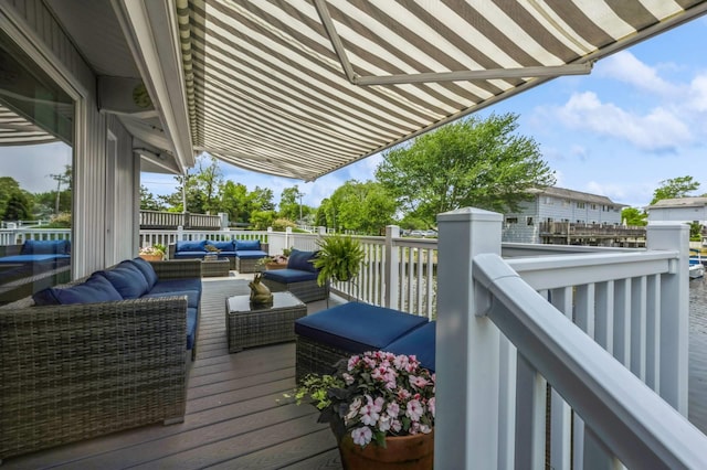35 Library Ave Unit 8X, Westhampton Beach, NY 11978 - wooden terrace with an outdoor hangout area